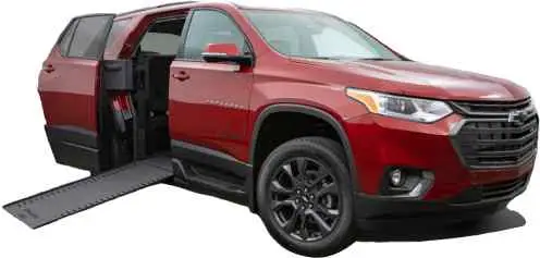 Red BraunAbility Chevrolet Traverse 2LT RS handicap SUV with the ramp deployed